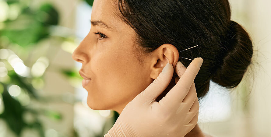 Woman Having Ear Acupressure Acupuncture Her